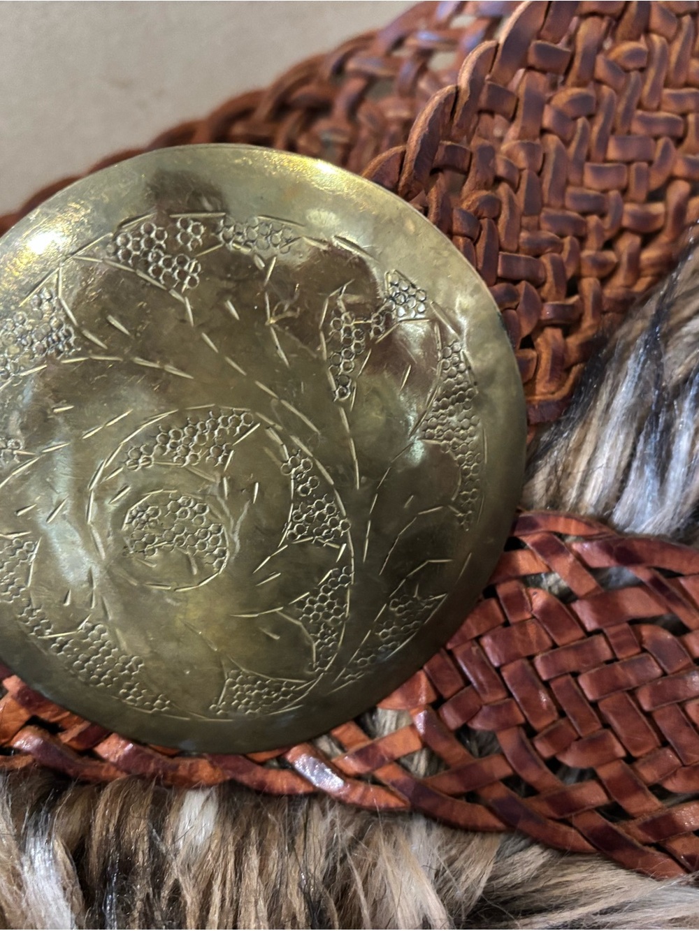 Braided Leather Concho Belt with Decorative Brass Medallion. Made in Morocco.
